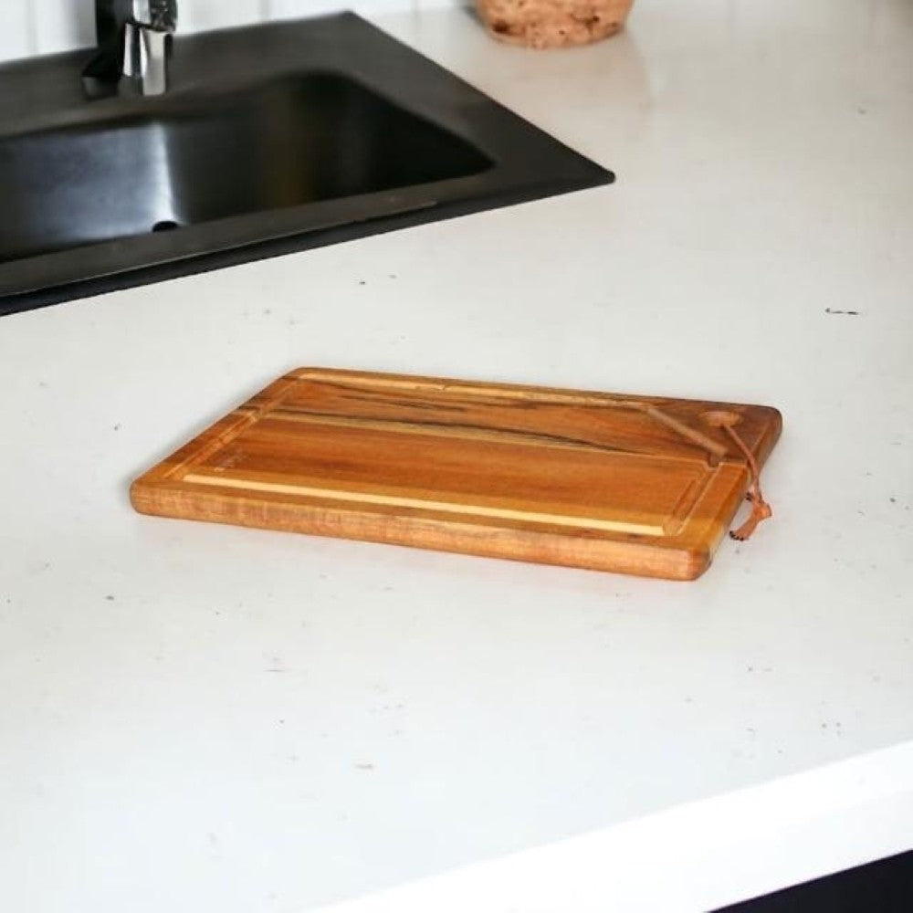 Aelgmark acacia wood cutting board with juice groove and hanging loop, 30x20cm.