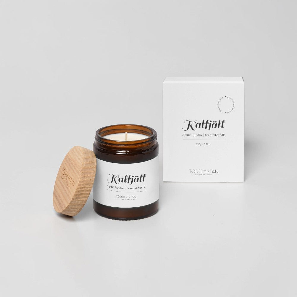 aelgmark Alpine Tundra scented candle in amber glass jar with wooden lid, 150g.