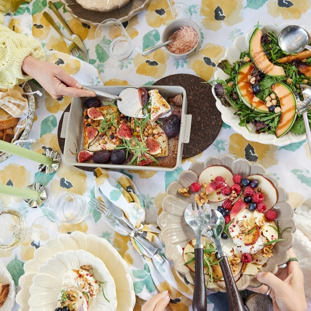aelgmark Astrid salad servers with stainless steel and chocolate brown wood handles, elegant serving utensils.