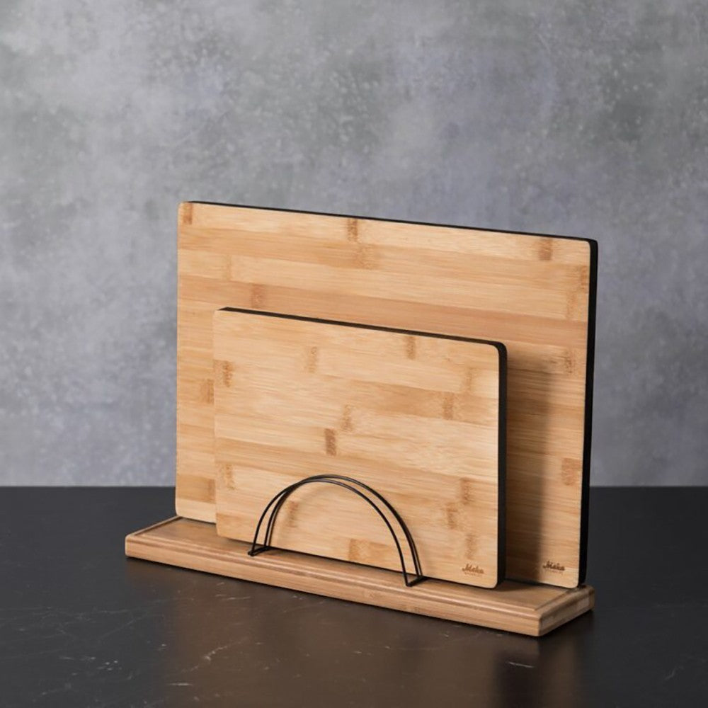 aelgmark bamboo cutting board organizer with black metal holder. Nordic design, holds up to four boards.