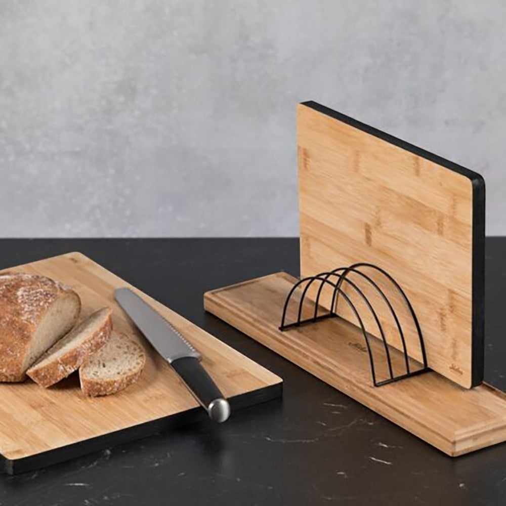 aelgmark Nordic style bamboo and steel cutting board holder. Organizes up to four boards.