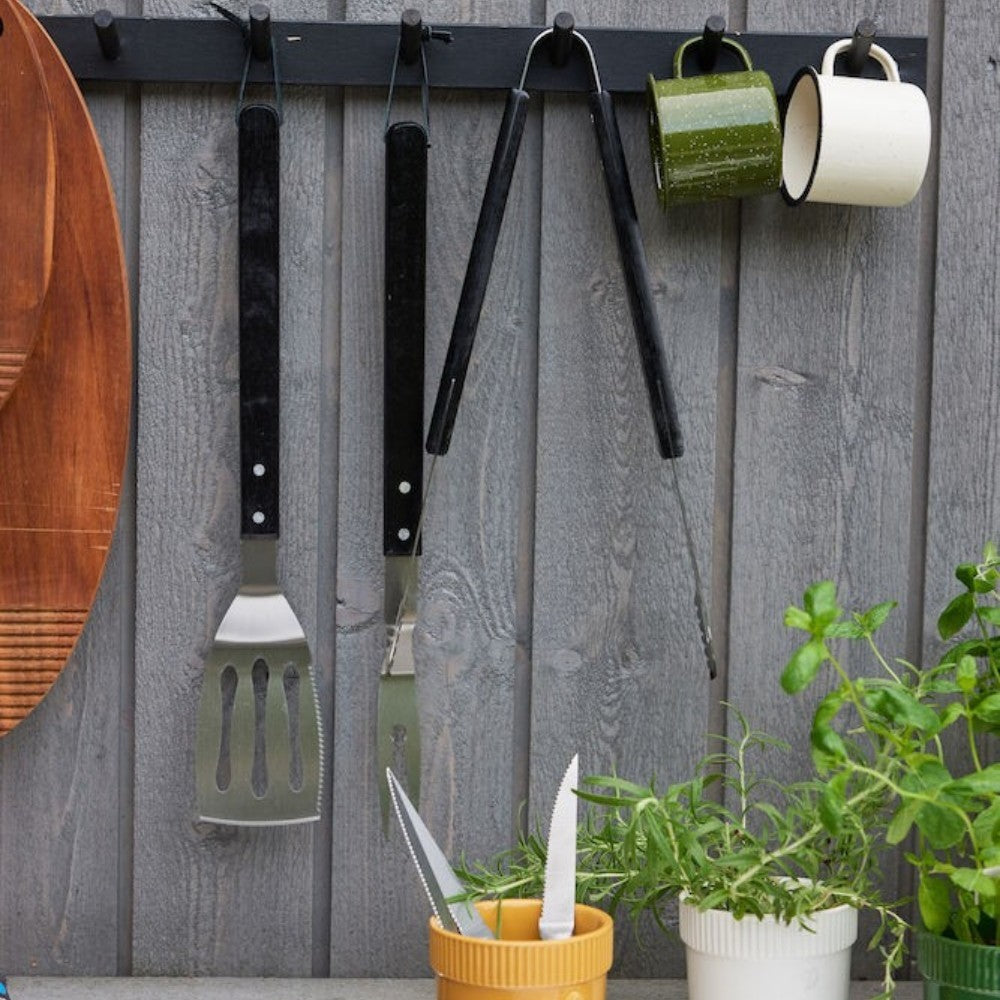 aelgmark BBQ grilling utensil set with spatula, tongs, and fork, black handles, stored in a drawstring bag.