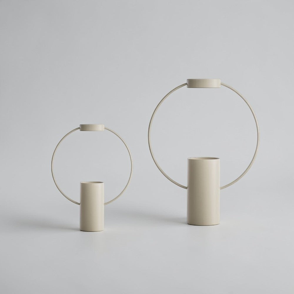aelgmark beige metal circular vase, modern minimalist design, available in two sizes.