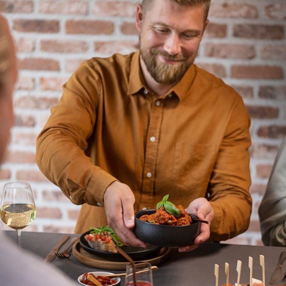 aelgmark black matte ceramic 14.5cm serving bowl with meatballs, perfect for everyday dining and gatherings.