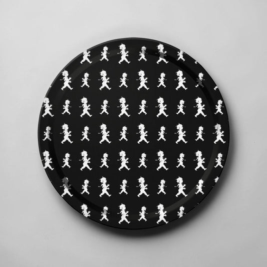 aelgmark black round tray with a repeating pattern of white cartoon boys running