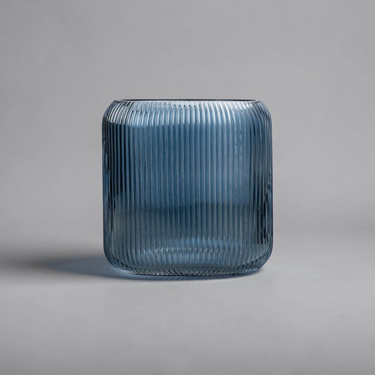aelgmark blue ribbed glass vase with a rectangular design and simple, clean lines. Nordic style.