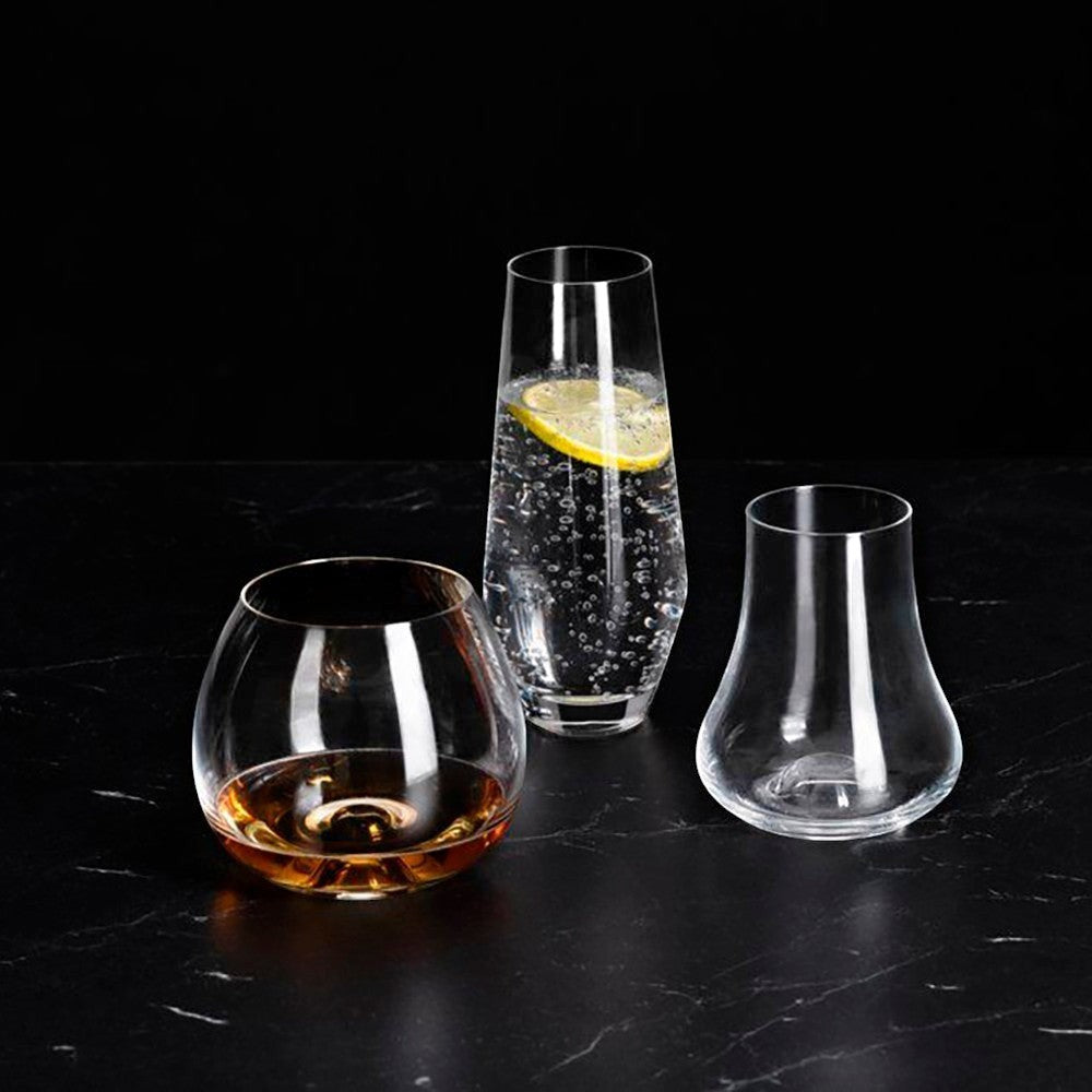 aelgmark clear glass brandy snifter and tall water glass with lemon slice