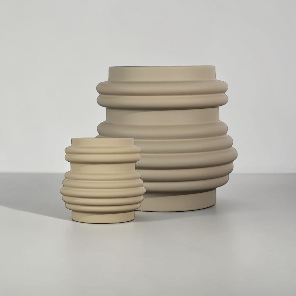 aelgmark ByOn Mira vase in matte almond stoneware with a soft-touch rubberized finish and ribbed sculptural design.