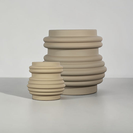 aelgmark ByOn Mira vase in matte almond stoneware with a soft-touch rubberized finish and ribbed sculptural design.
