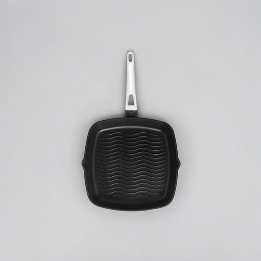 aelgmark black cast aluminum grill pan with non-stick coating and ridged surface for grill marks.