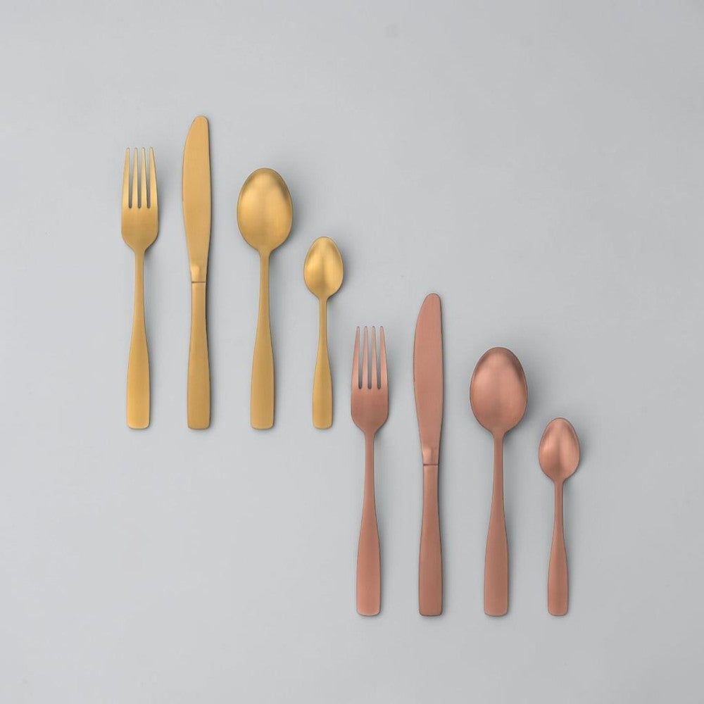 Aelgmark champagne gold stainless steel cutlery set, including fork, knife, spoon, and teaspoon. PVD coating.