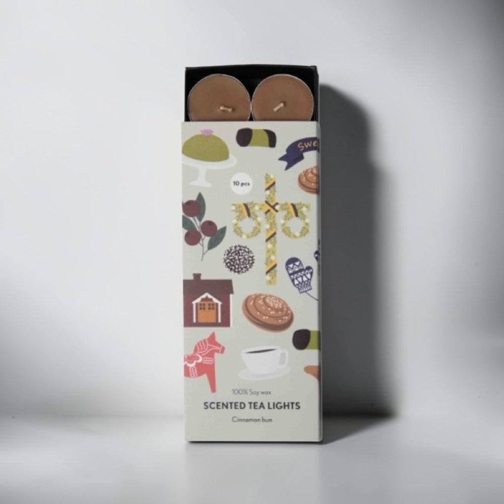 aelgmark cinnamon bun scented tea lights, 100% soy wax, pack of 10. Box features Scandinavian folk art designs.