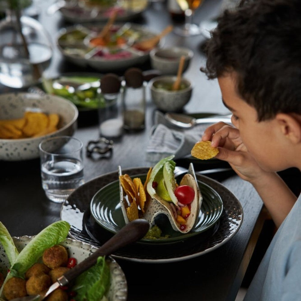 Aelgmark Ditte taco holder in grey with speckle pattern, handmade ceramic, holds tacos or bread rolls.