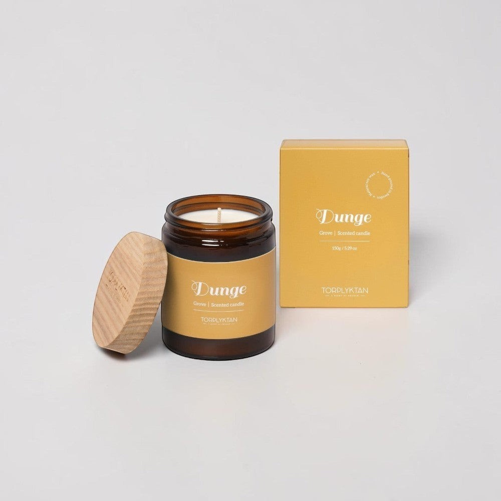 aelgmark Dunge Grove scented candle in amber glass jar with wooden lid, 150g. Notes of violet, sage, and orchid.