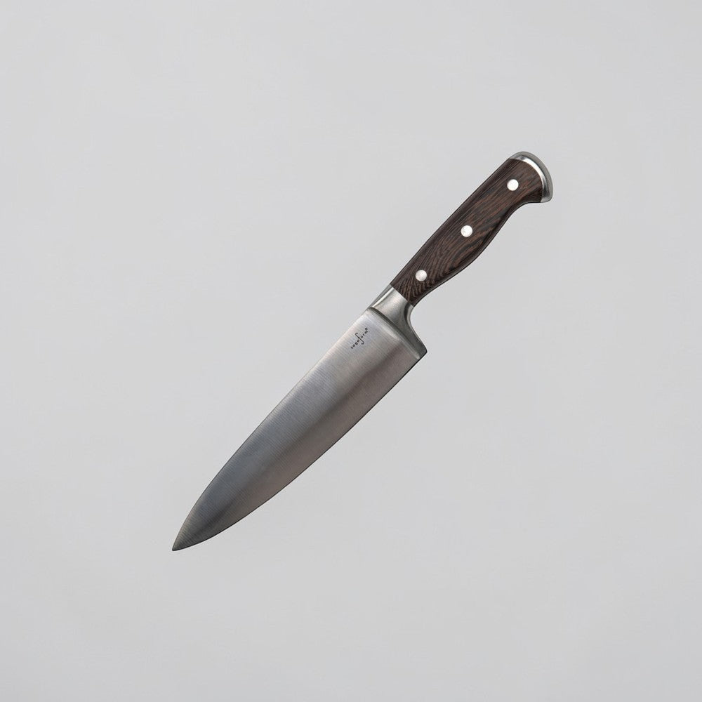 aelgmark Erik stainless steel chef's knife with dark wood handle and wave grip design.