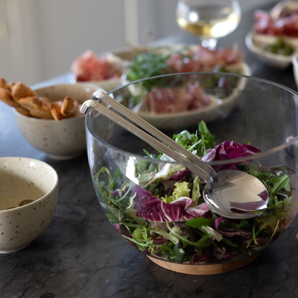 aelgmark Estelle stainless steel salad servers with unique handle design for serving salad.