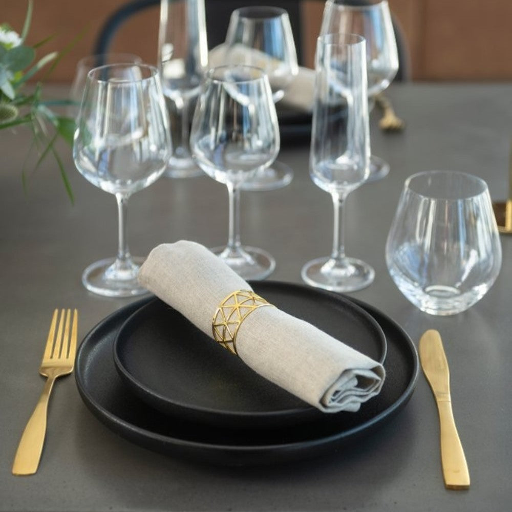 Aelgmark champagne gold 16-piece stainless steel cutlery set with PVD coating, including 4 knives, forks, spoons, and teaspoons.