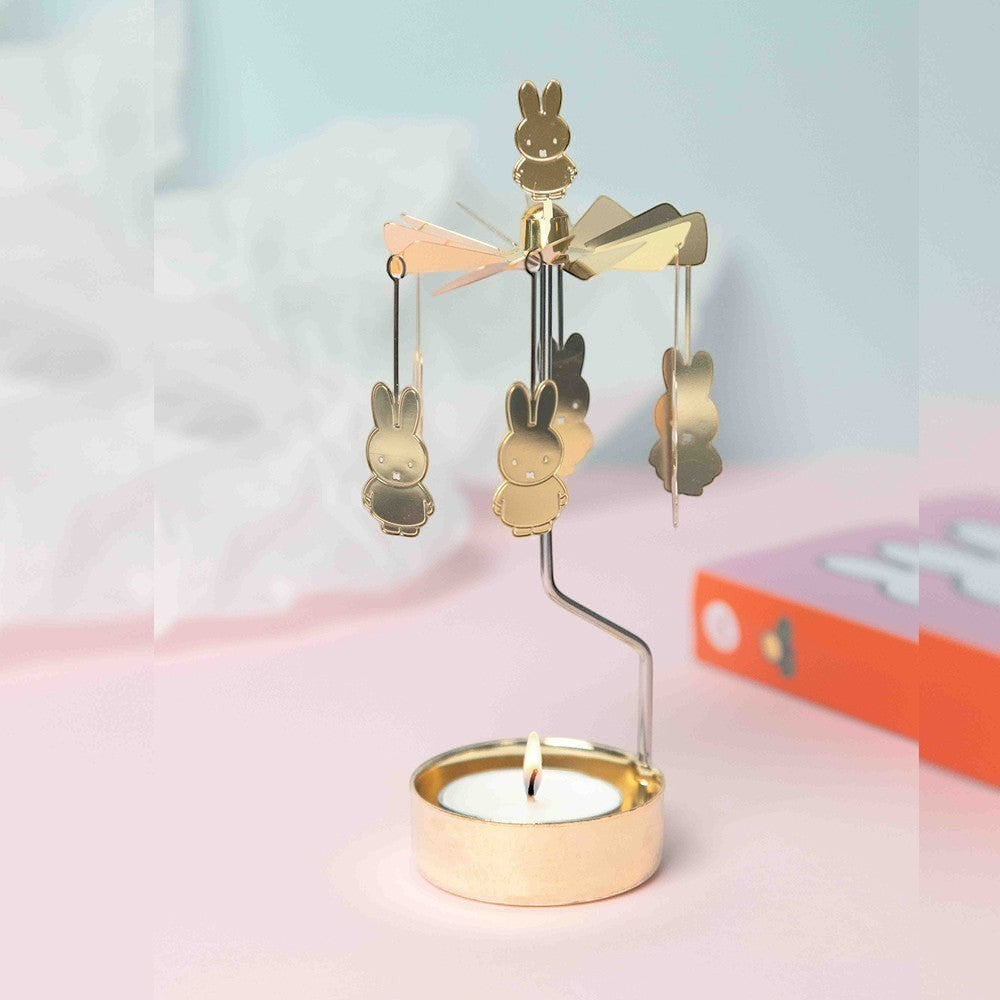 aelgmark gold Miffy bunny rotating candle holder with tea light candle and hanging Miffy charms.