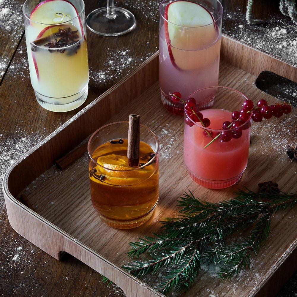 aelgmark Hanna oak serving tray with curved edges and side handles, perfect for drinks.