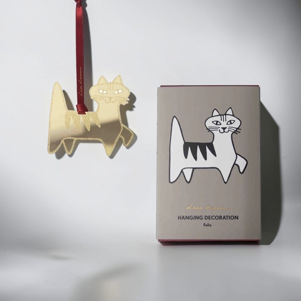 aelgmark Lisa Larson Felix gold glitter cat hanging decoration with red ribbon.