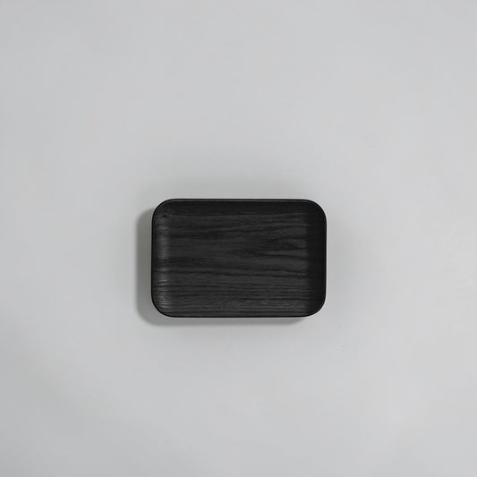 aelgmark matte black wooden serving tray with rounded corners, made from FSC certified wood.