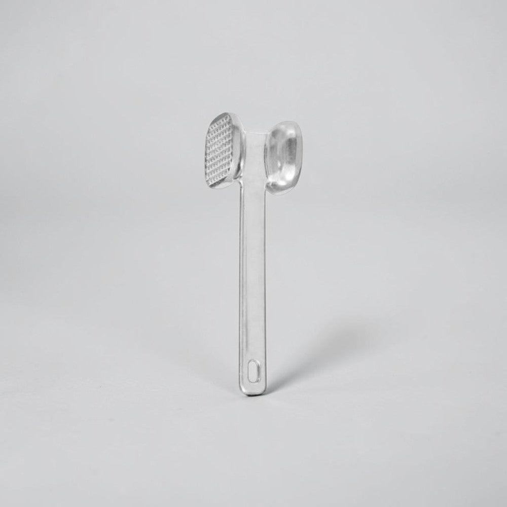 aelgmark meat tenderizer with textured and smooth sides for pounding and flattening meat.