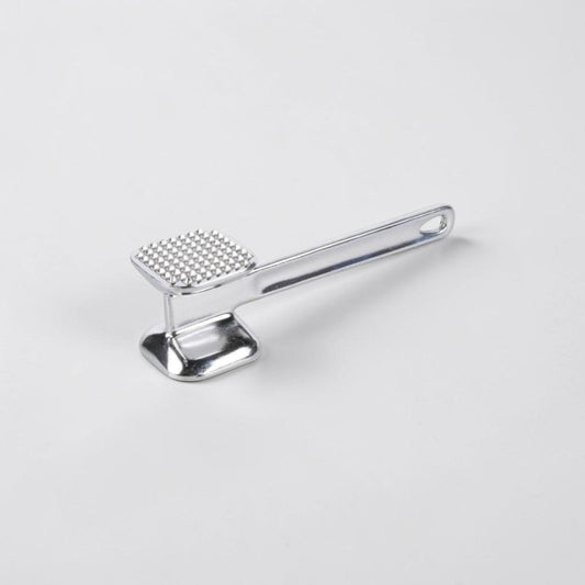 aelgmark 北歐生活選物 silver metal dual-sided meat tenderizer mallet with textured and flat surfaces.