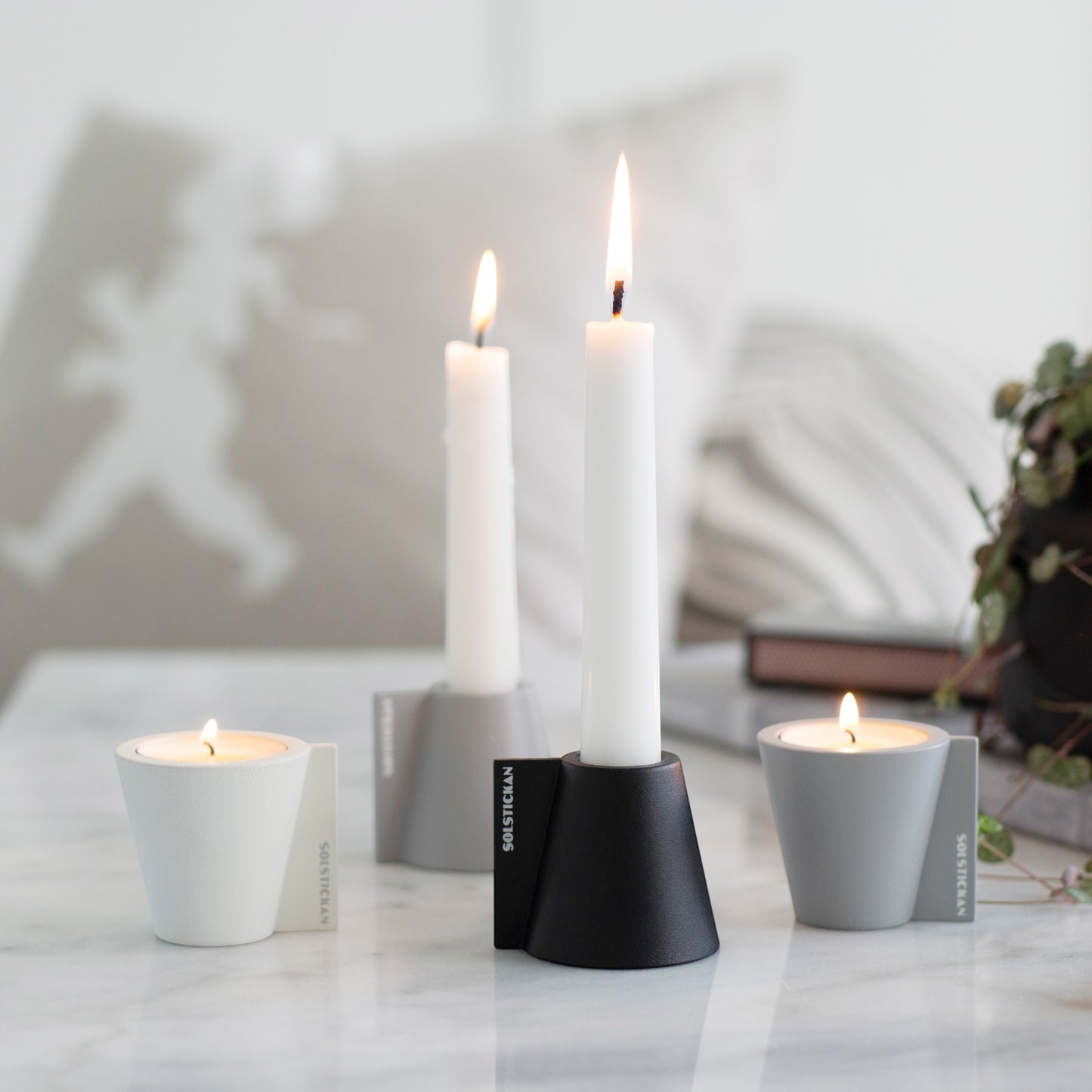 aelgmark北歐生活選物 modern matte black, grey, and white candle holders for taper and tea lights.
