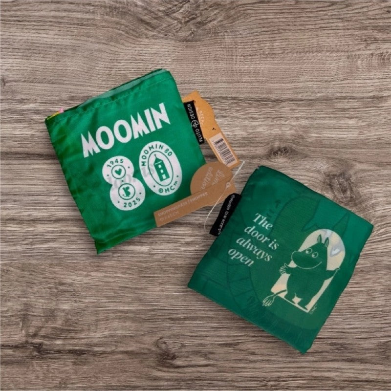 aelgmark Moomin 80th anniversary green shopping bag made from 100% recycled PET, featuring Moomin characters and text.
