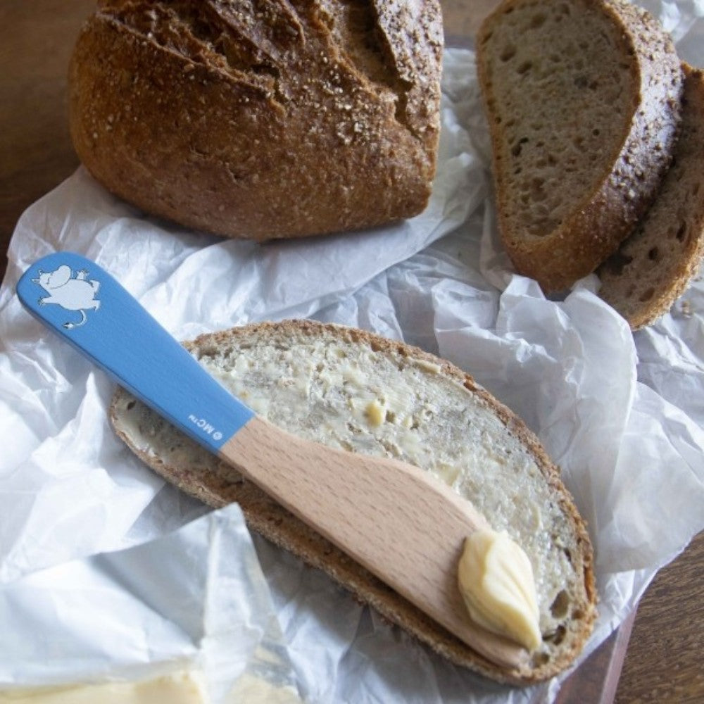 aelgmark Moomin blue juniper wood butter spreader with a Moomin character illustration.