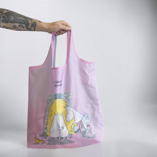 aelgmark pink Moomin 80th anniversary reusable shopping bag made from 100% recycled PET, featuring Moomin characters by a fireplace.
