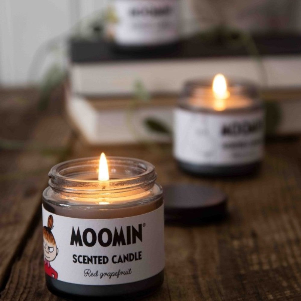 aelgmark Moomin red grapefruit scented candle in glass jar with lid, part of a gift set.
