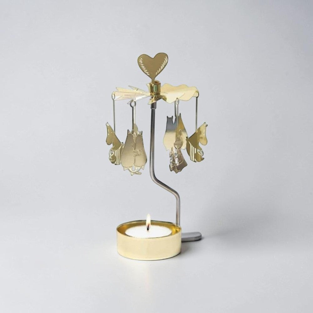 aelgmark Moomin 80th anniversary rotating candle holder with gold metal finish and heart topper.