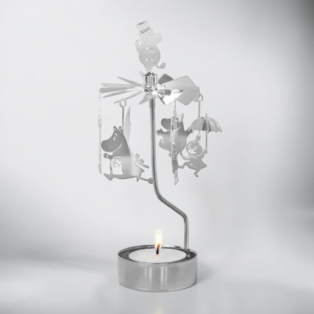 aelgmark Moomin family silver spinning candle holder with hanging charms and a lit candle. Features Moomintroll and friends.