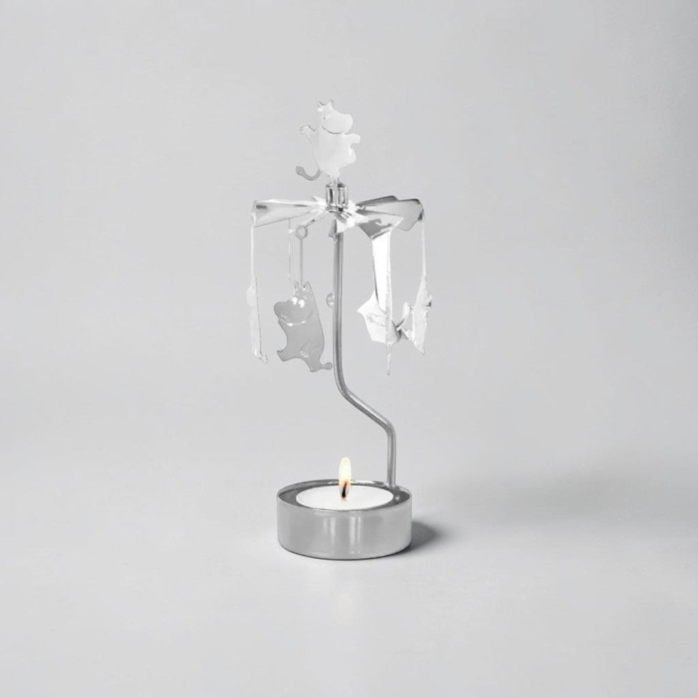 aelgmark Moomin silver spinning candle holder with hanging Moomin figures and a lit tea light.