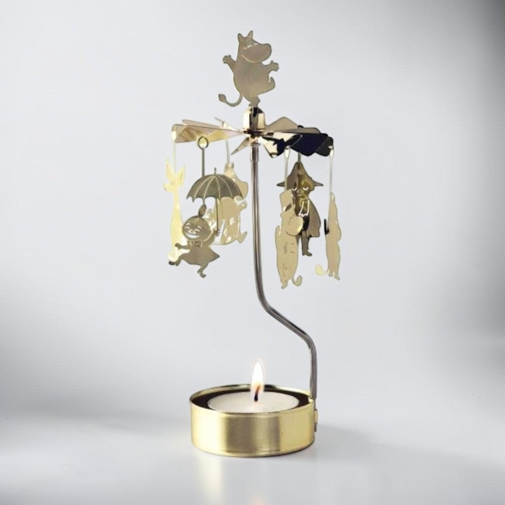 aelgmark Moomin characters spinning candle holder with included candle. Gold metal.