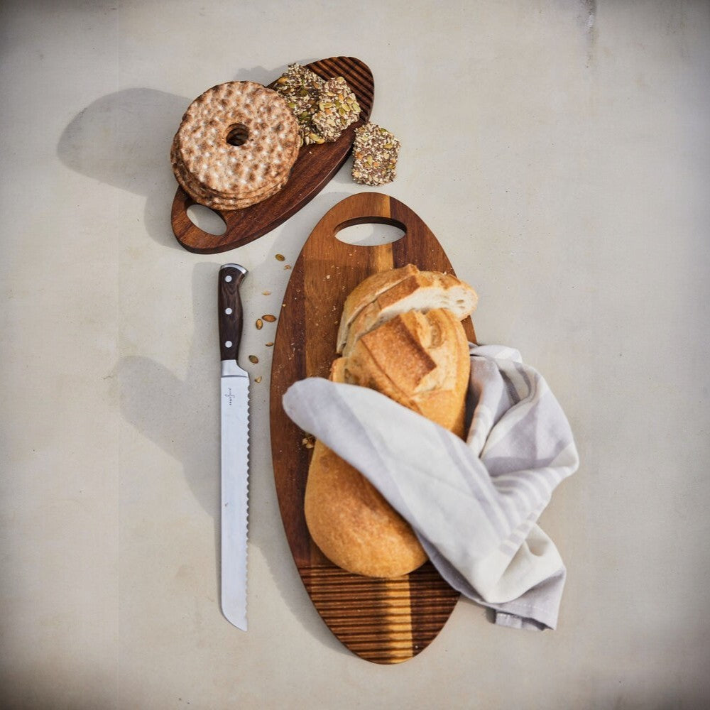 aelgmark 북유럽 생활선물 oval acacia wood serving board with bread and knife. Unique grain patterns.