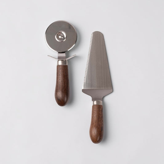 aelgmark Astrid stainless steel pizza cutter and server set with dark wood handles.