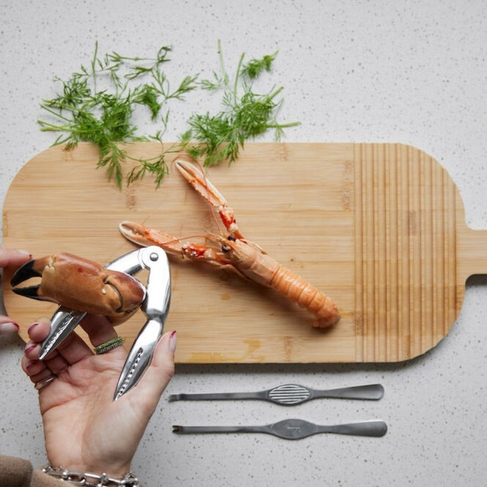 aelgmark Sivan seafood fork set made of stainless steel, includes crab cracker and two small forks for lobster and shellfish.