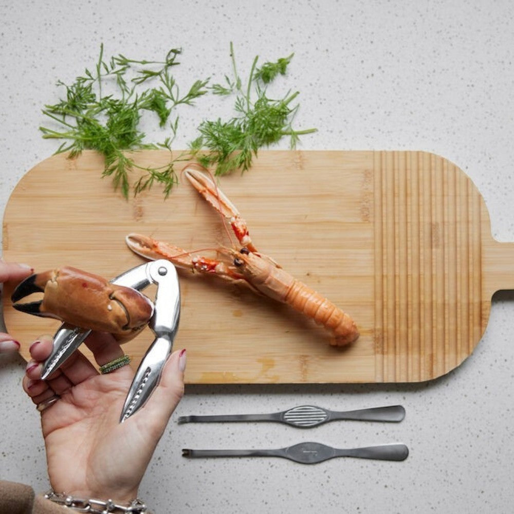 aelgmark Sivan seafood fork set made of stainless steel, includes crab cracker and two small forks for lobster and shellfish.