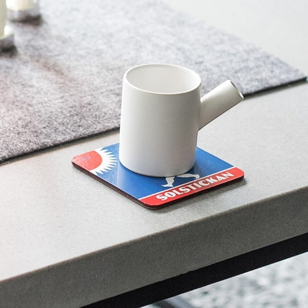 aelgmark北歐生活選物 Solstickan boy design coasters, set of 4, featuring red sun and blue background.
