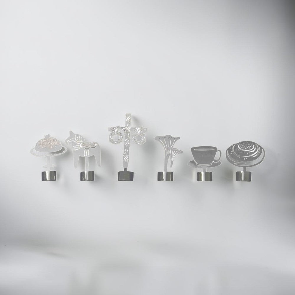 aelgmark set of 6 Swedish cultural symbols wine glass charms: cake, Dala horse, maypole, mushroom, coffee cup, cinnamon bun.