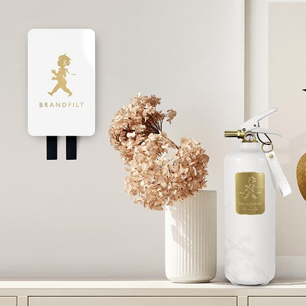 aelgmark white fiberglass fire blanket 120x120cm in decorative steel box with gold embossed boy. Includes fire extinguisher.